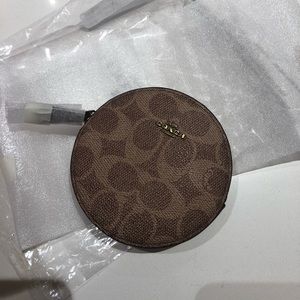 Brand new Coach round coin purse